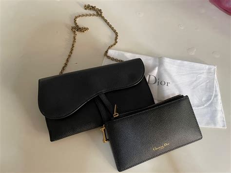 dior saddle wallet on chain.